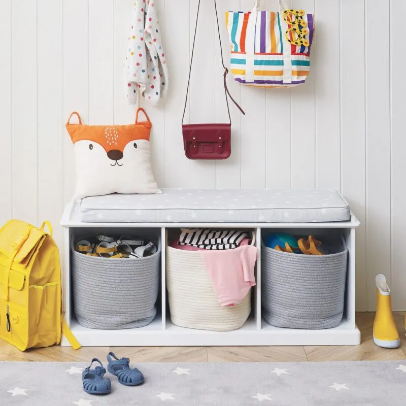 White storage bench with 3 open storage spaces