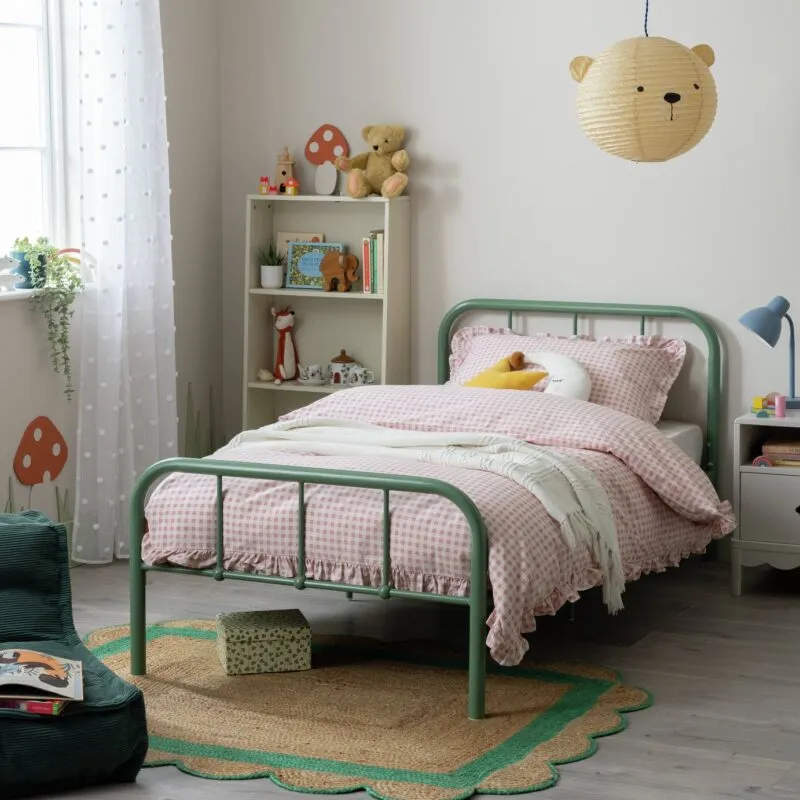 Green-painted metal bed frame