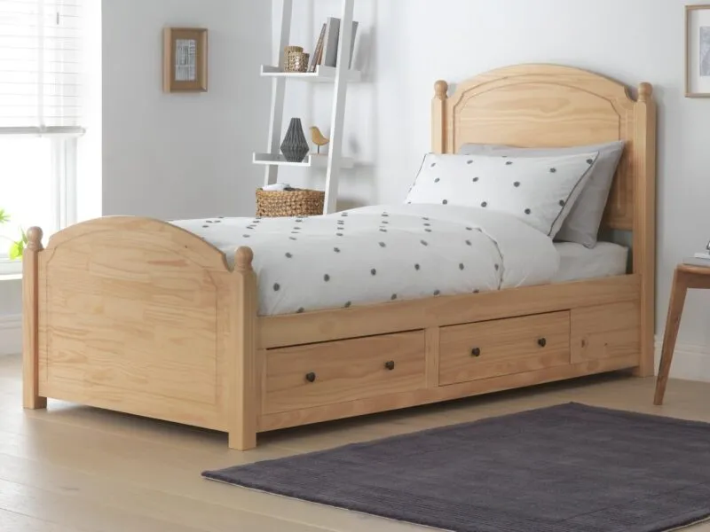Pine bed frame with curved head and foot board with drawers in the base