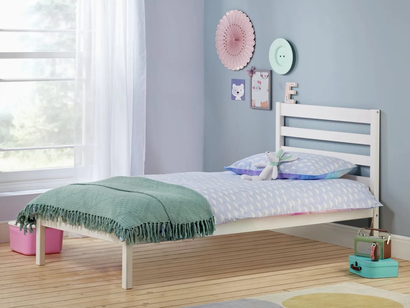 white-painted single bed