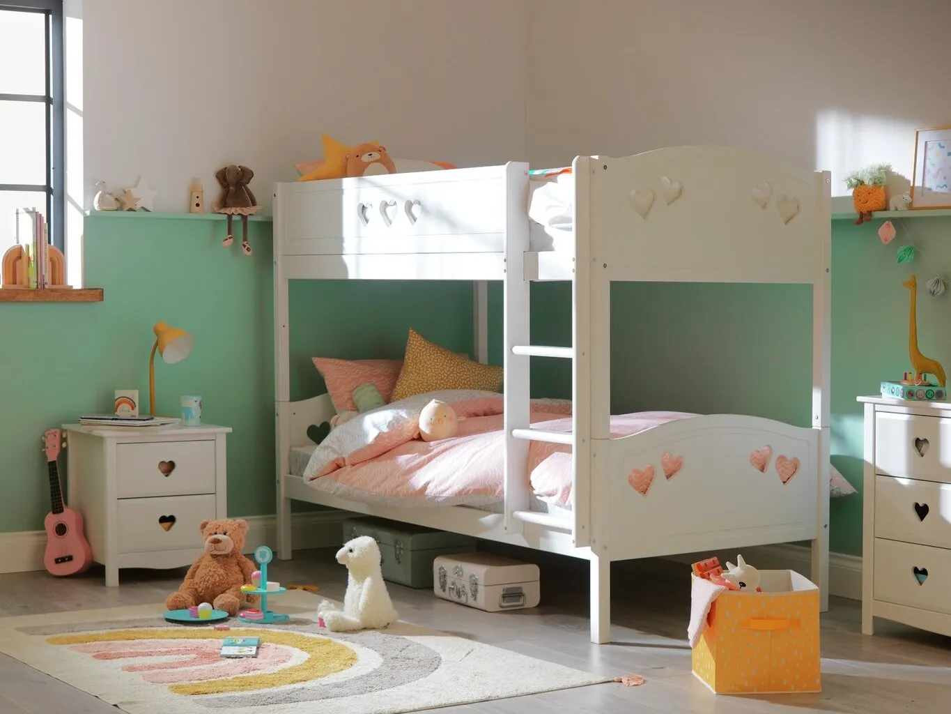 White bunk bed with heart cut outs