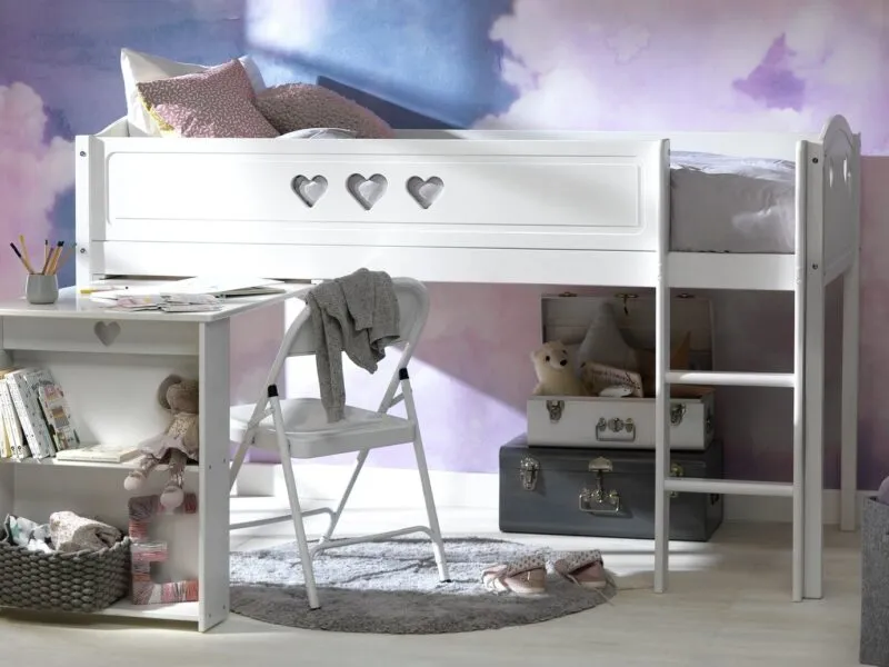White mid sleeper bed with heart cut-outs and pull-out desk