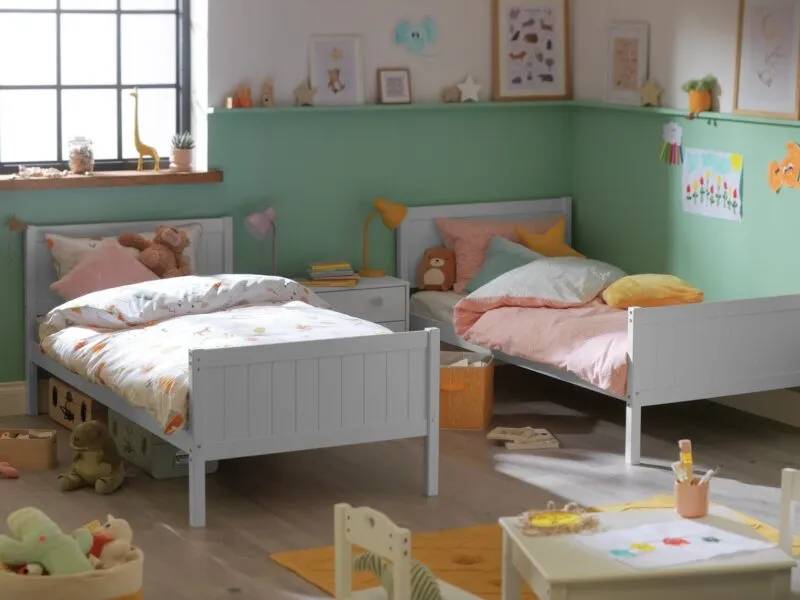 Pair of grey-painted single beds