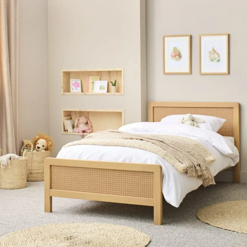 Single size bed frame with an oak wood grain finish and rattan head and foot board
