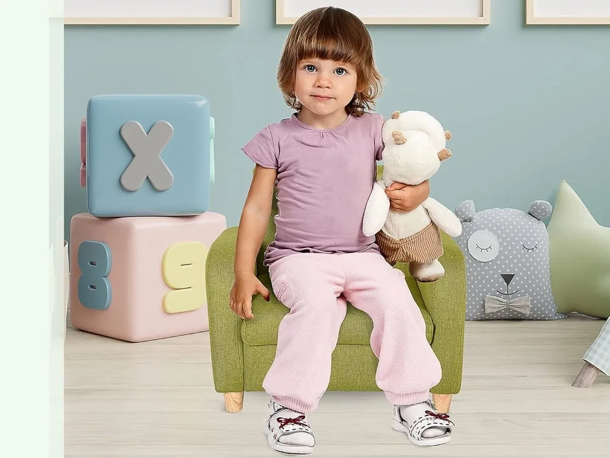 Kid's green fabric armchair
