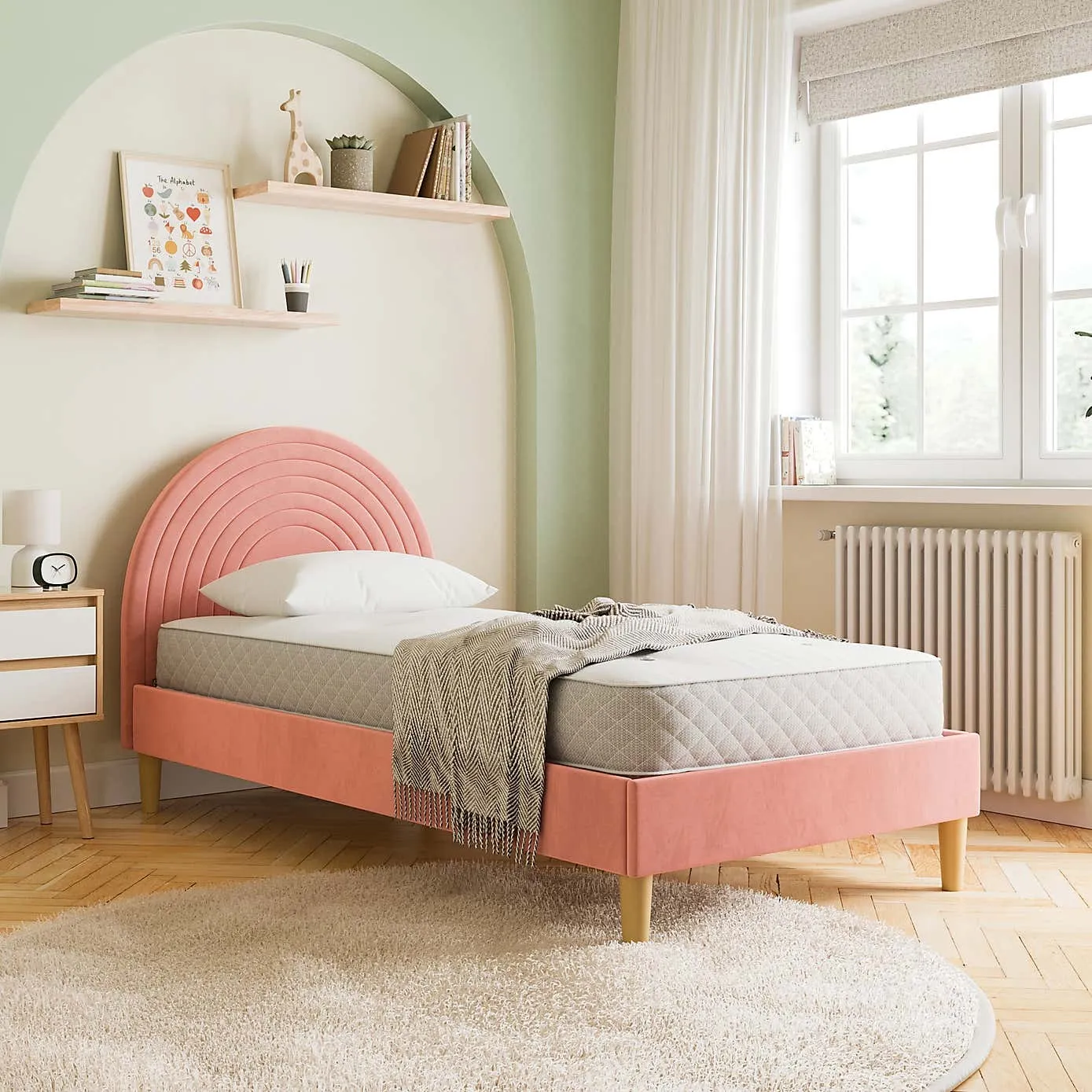 Pink velvet upholstered single bed