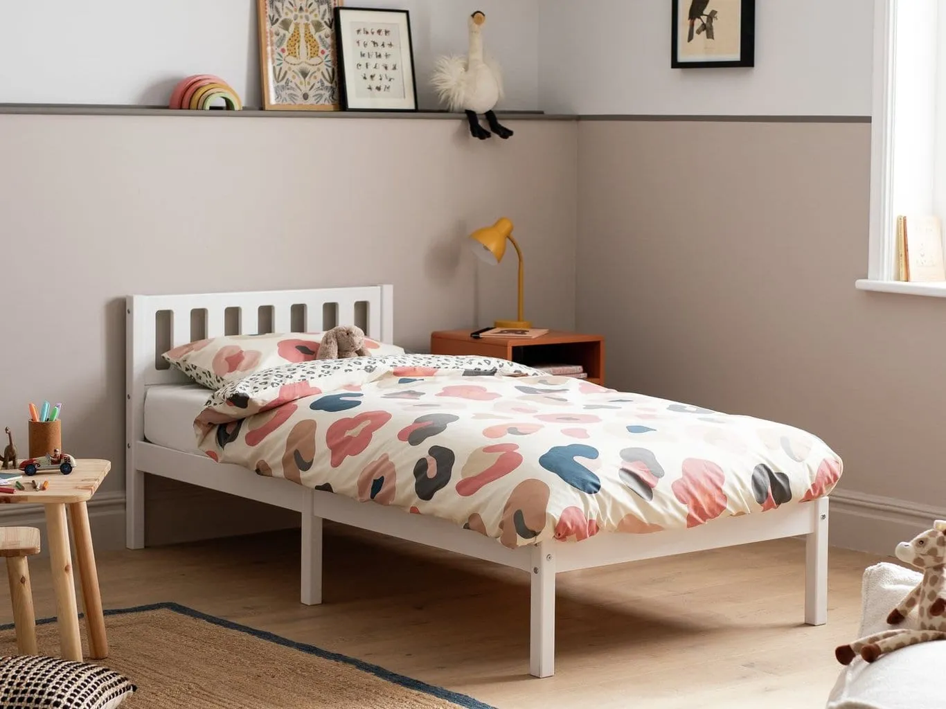 White single bed frame with slatted headboard