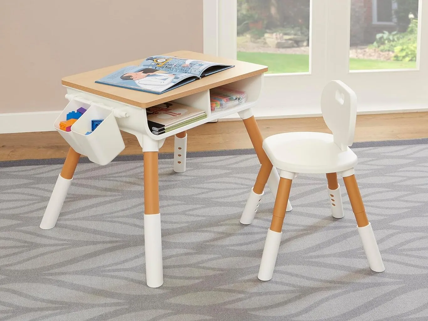 Kid's height-adjustable table and chair set