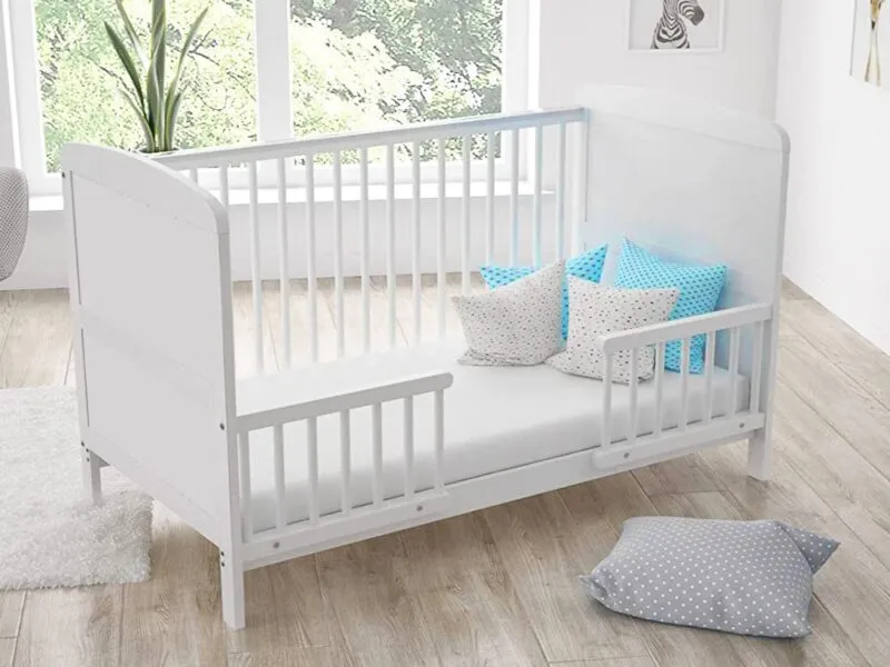White-painted cot bed