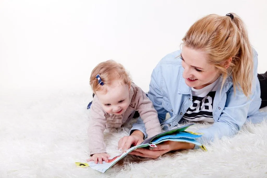 Mum reading to her child